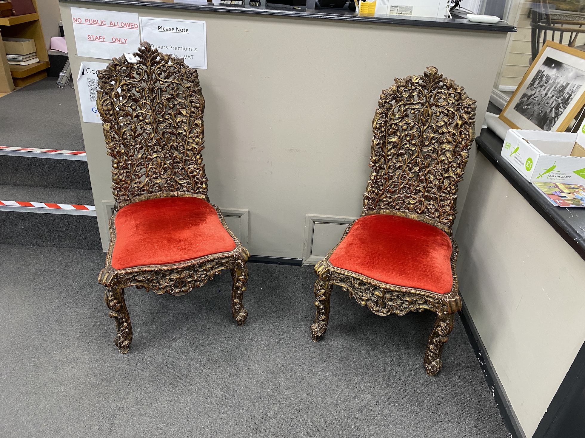 A pair of 19th century Anglo Indian carved high back chairs, width 52cm, height 123cm